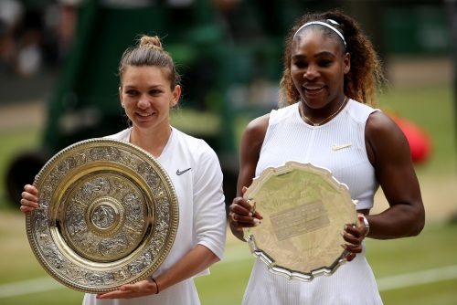 Simona Halep (left) celebrates with her trophy after winning the women's singles final, alongside runner-up Serena Williams