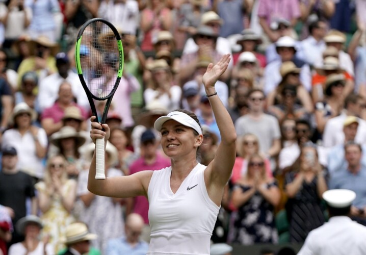 Simona Halep celebrates victory over Elina Svitolina
