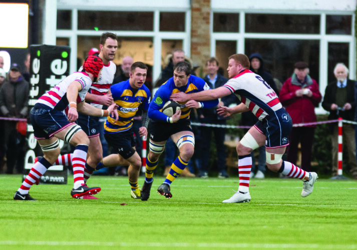 Captain Hamish Barton (dark hair running between two tacklers) who scored two of our tries on Saturday