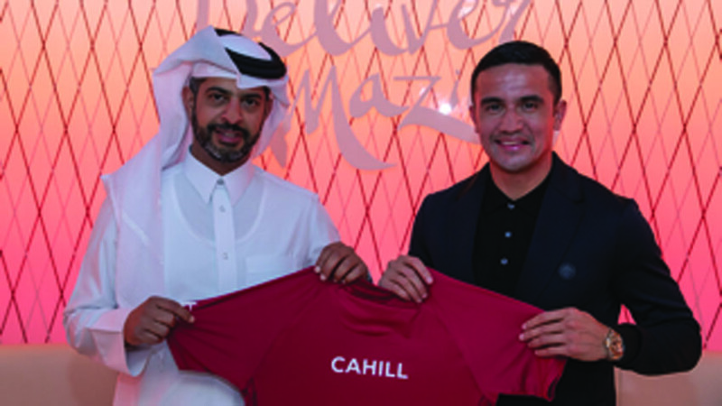 Tim Cahill with Nasser Al-Khater Deputy Secretary of Qatar‘s Supreme Committee