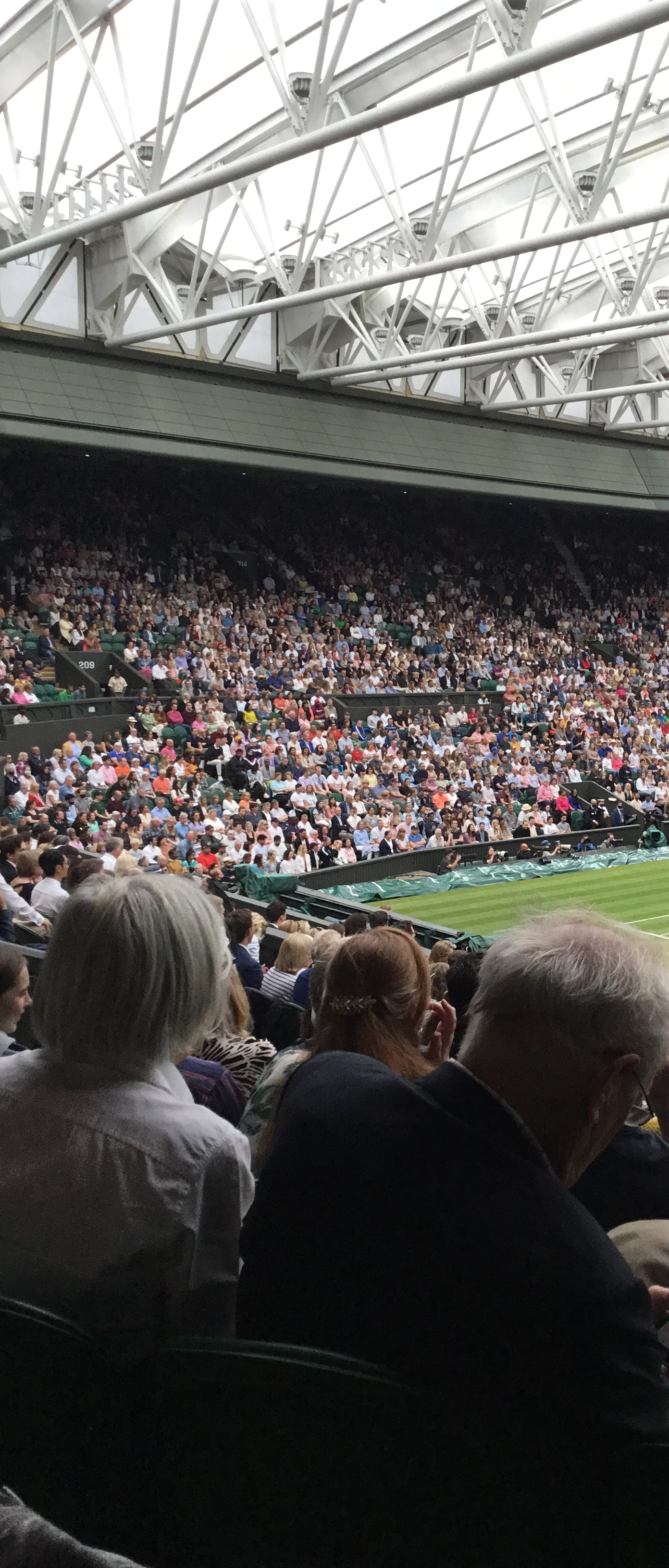 Centre Court was filled to the rafter with dry spectators Photo by Paul Lagan