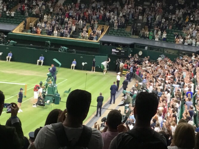 Andy Murray and Denis Shapovalov on Centre Court at Wimbledon