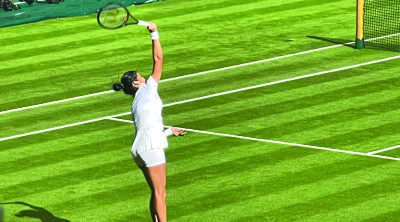 Emma Raducanu serving on Centre Court Pictures: Paul Lagan
