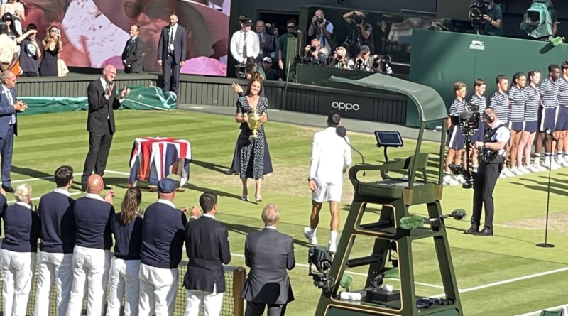 Djokovic receives the trophy from the Duchwss of Cambridge Picture: Paul Lagan