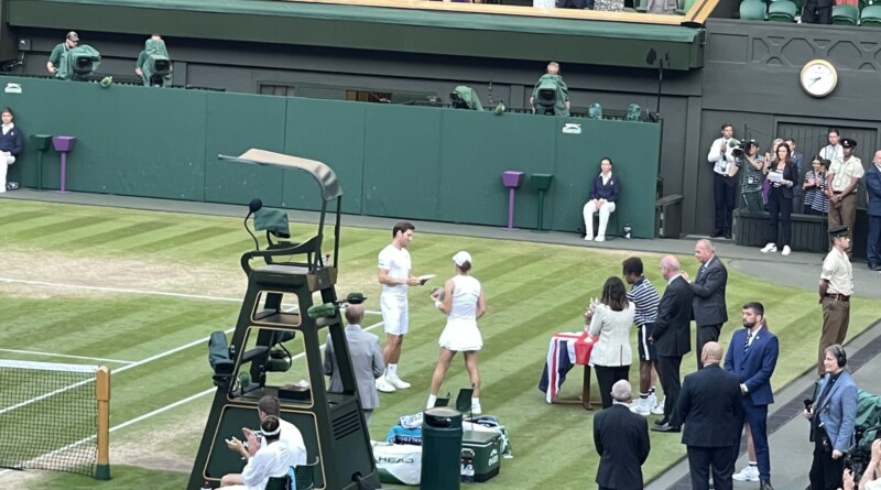 Skupski and Krawczyk get their Mixed Doubles trophy Picture: Paul Lagan
