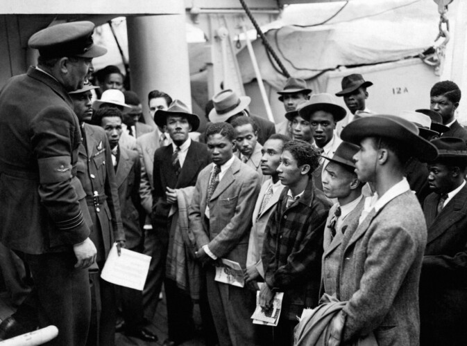 Jamaican immigrants welcomed by RAF officials from the Colonial Office after the ex-troopship HMT 'Empire Windrush' landed them at Tilbury Docks on June 22 1948 Picture: PA Images / Alamy Stock Photo