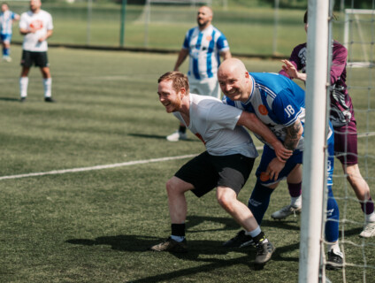 Council takes on grassroots football team in friendly to celebrate fostering
